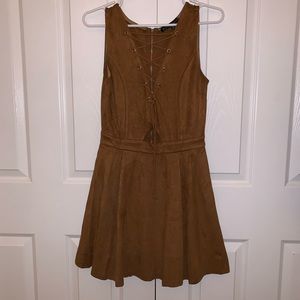 Suede baby doll dress. Adjustable bust.